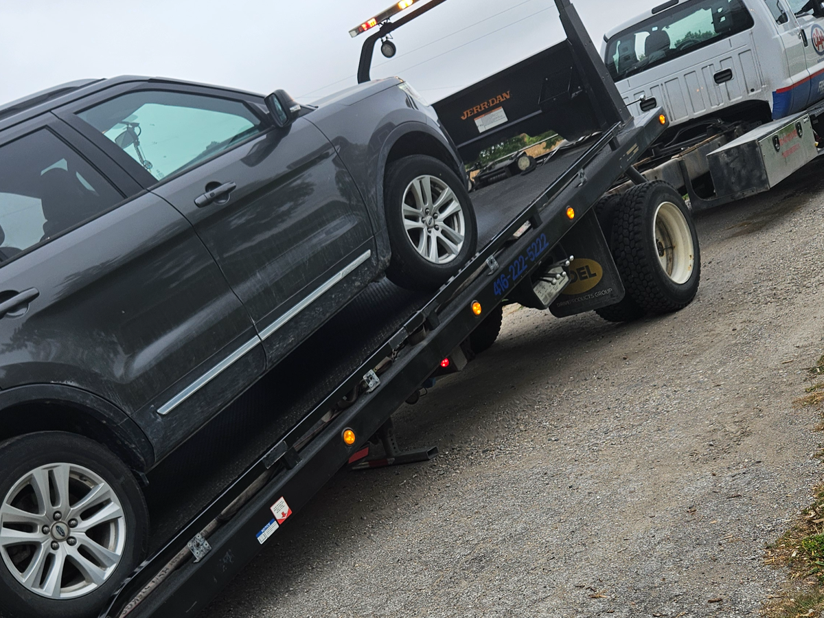 Family seeking help with vehicle repairs campaign photo, 1 of 3