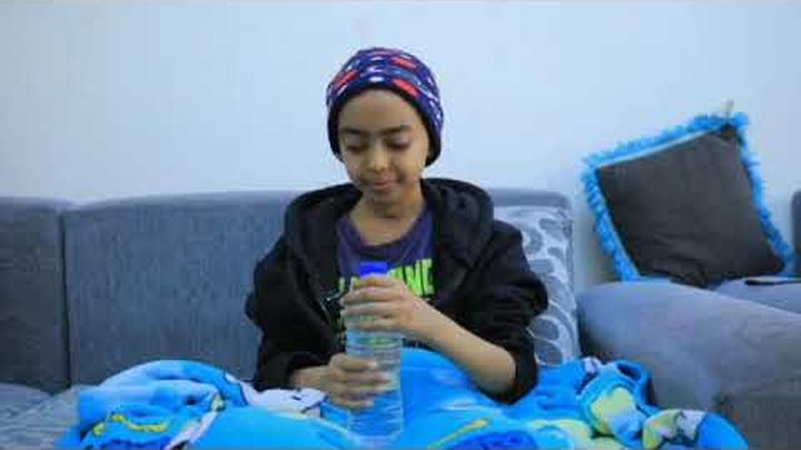 ህጻን ህያብኤል! ብልሒ ኣእምሩኡ ብሰንኪ ዘጋጠሞ ማህሰይቲ ርእሲ ከይቅህም ኢደይ ኢድካ ንበል። video thumbnail, 1 of 3