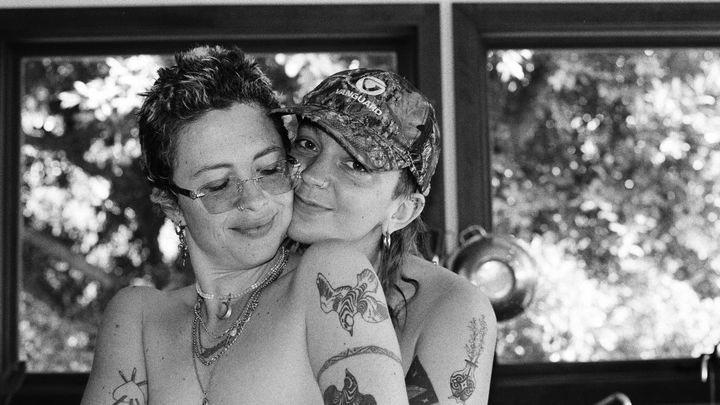 Lexi stay home with their partner & queer family campaign photo, 1 of 7