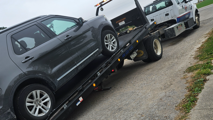 Family seeking help with vehicle repairs campaign photo, 1 of 3