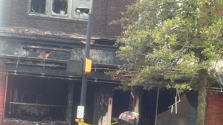 Family who lost homes in fire campaign photo, 1 of 2