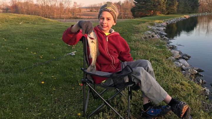 Boy Fishing and Red Chairs