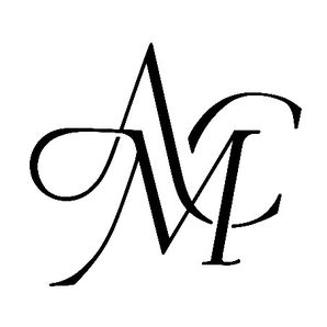 M C