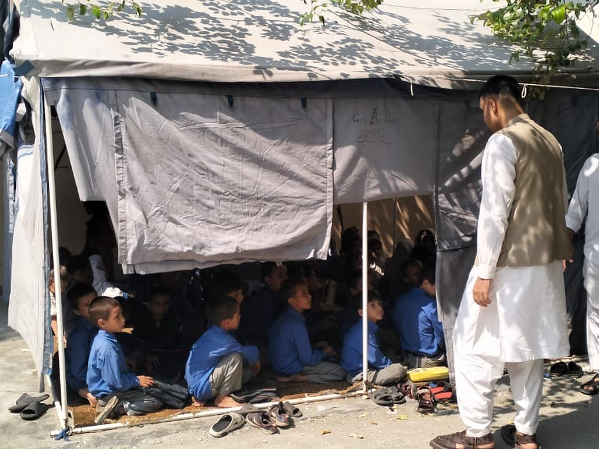 Build Classrooms for Children Studying in Tents campaign photo, 1 of 7