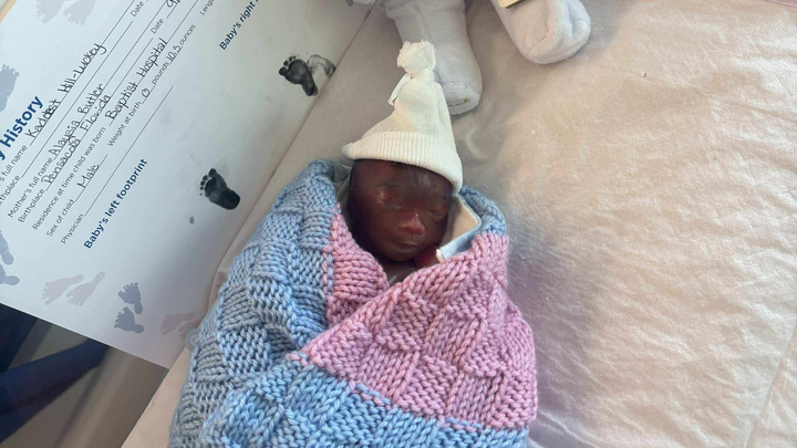 Helping A Mother Bury Her Child . campaign photo, 1 of 6