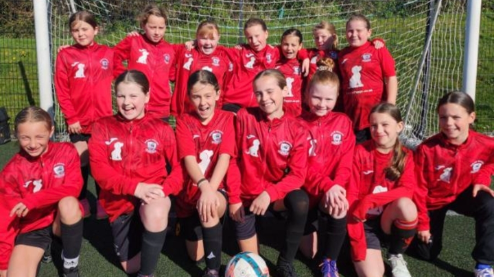 Baglan Dragons U11 girls football team, sponsored beach run campaign photo, 1 of 3