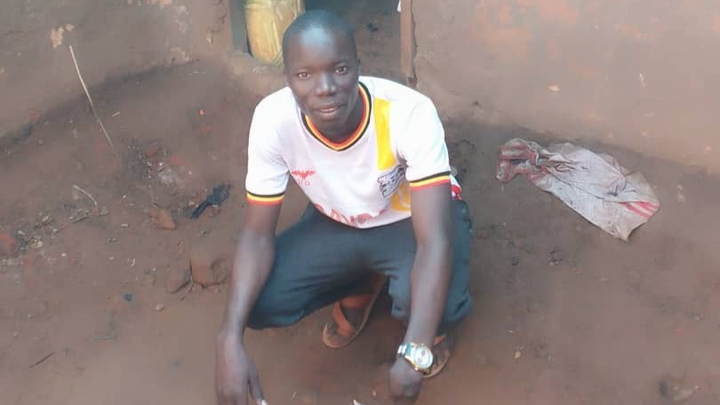 Help one-handed boy trade a mud floor for a degree campaign photo, 1 of 7